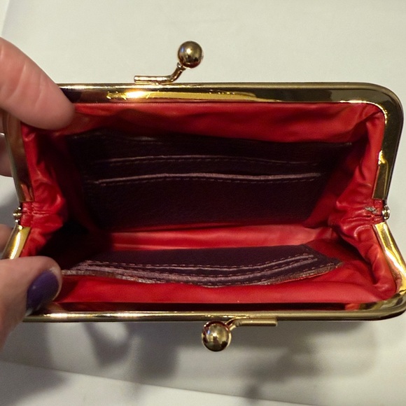 Dooney & Bourke Dark burgundy Leather Kisslock wallet.
